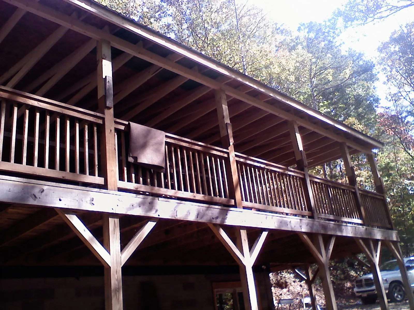 Timber framing under a new elevated porch and deck — Roof Leak Repair in North Garden by Roofing Brothers